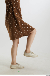 Aera  1 brown dots dress casual dressed flexing leg…